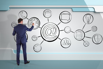 Businessman drawing multimedia interface sketch on a board 3D rendering