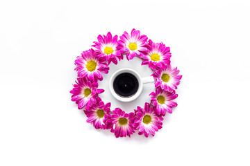 Floral pattern with cup of coffee on white background top view copyspace