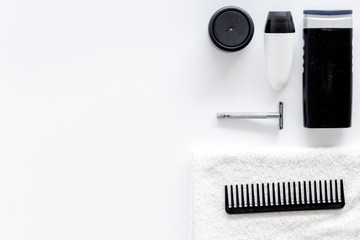 Men's shaving. Tools and cosmetics on white background top view copyspace