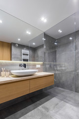 Gray bathroom with long countertop