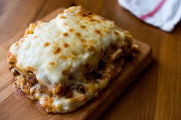 Lasagna with minced meat, Bolognese sauce and melted cheese.