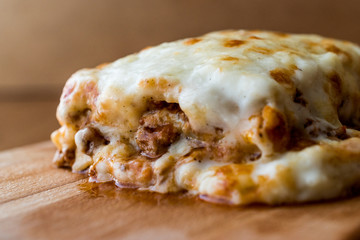Lasagna with minced meat, Bolognese sauce and melted cheese.