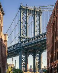 Empire State building through the Manhattan Bridge, Washington St, Dumbo, Brooklyn, New York, USA
