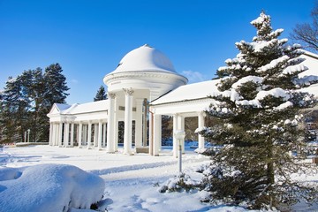 Pavilion of cold mineral water springs Carolina and Rudolf under snow - winter in Marianske Lazne...