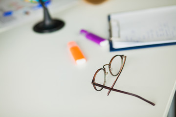 Fototapeta na wymiar Business teamwork brainstorming concept glasses on office table