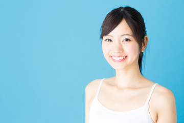 attractive asian woman beauty image isolated on blue background