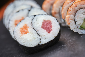sushi on the black background