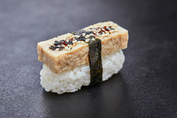sushi on the black background