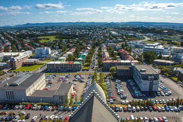 Obraz premium View of the central Reykjavik city in summerfrom the top of Hallgrimskirkja church, Iceland.