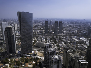 Obraz premium TEL AVIV, ISRAEL Cityscape with towers of Azrieli Center and Sarona area in Tel Aviv, . Azrieli center is the main landmark of Tel Aviv. Old and New Architecture in Tel Aviv - Old and modern bui