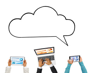 Top view of businesspeople sitting at table and using gadgets