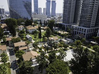 TEL AVIV, ISRAEL Cityscape with towers of Azrieli Center and Sarona area in Tel Aviv, . Azrieli center is the main landmark of Tel Aviv. Old and New Architecture in Tel Aviv - Old and modern bui