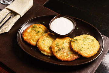 potato pancakes with sour cream