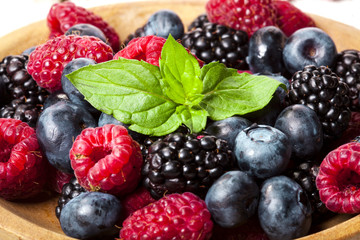 Berries Background. Strawberries, Blueberry, Raspberries, and Blackberry.