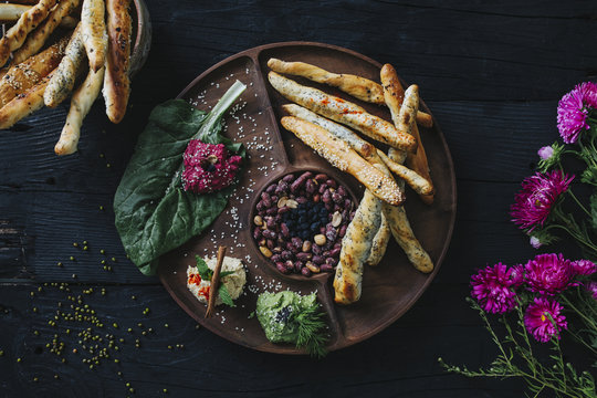 Bread Sticks Served on Tapas Wooden Plate