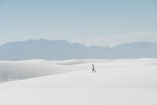 Lonely Man Walking in Desert