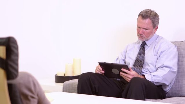 Businessman using iPad
