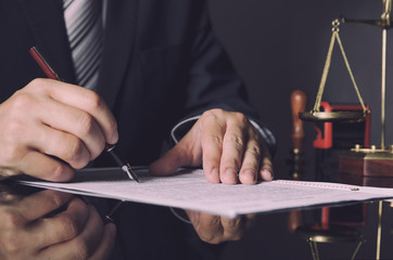 Attorney in suit working in office