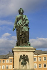 Fototapeta na wymiar Mozart statue in Mozartplatz, Salzburg, Austria