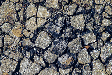 Obraz premium Busted up pavement