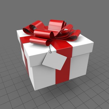 Gift box with red bow and tag