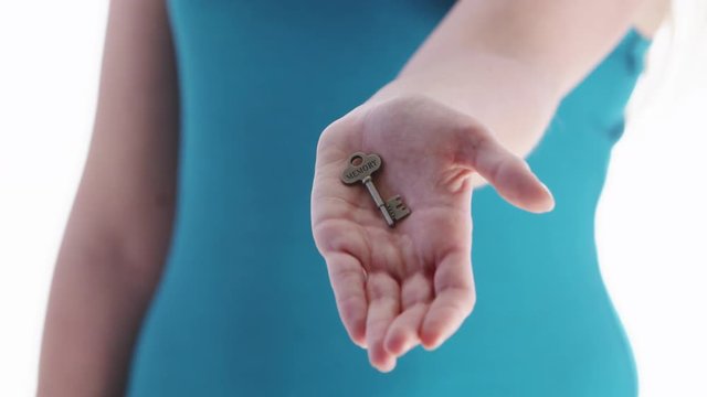 Woman holding key