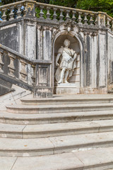 Staircase with statue of King in park