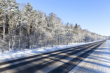 photo of a diagonal asphalt road