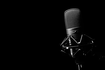 studio condenser microphone, isolated on black. copy space on left © princeoflove