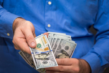 Handing Over a Hundred