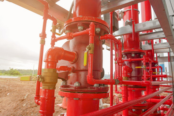 red industrial pipe in construction site building