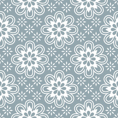 Fototapeta na wymiar Geometric seamless pattern. Modern floral ornament. Gray and white color. Vector illustration. For the interior design, wallpaper, decoration print, fill pages