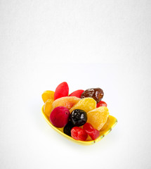 Dried fruits or assorted preserved fruits on background.
