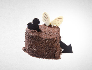 cake or love shaped chocolate cake on a background.