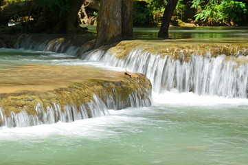 Water flowing over rocks in the forest,huai mae khamin waterfall,thailand.