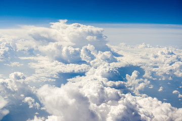 Blue clouds high above the ground