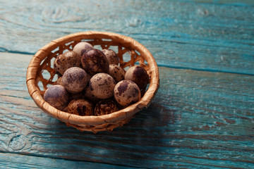 Image of blue table with quail eggs