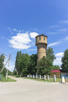 Old fashioned water tower made of bricks,  infrastructure reservoir