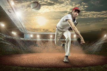 Obraz na płótnie Canvas Baseball players in action on the stadium.