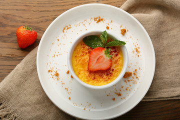 Creme brulee dessert with berry