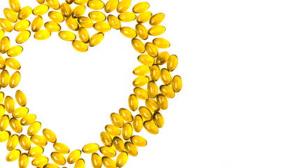 Heart shaped of cod liver oil isolated on white background with copy space. Source of Omega-3 (DHA+EPA) and vitamin A & D helps growth development and absorption of calcium and phosphorous in the body