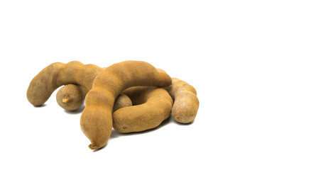 Tamarind - Sweet ripe tamarind isolated on white background with clipping path.