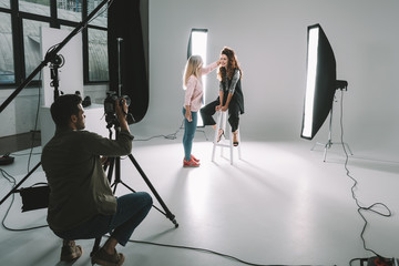 photographer, makeup artist and model