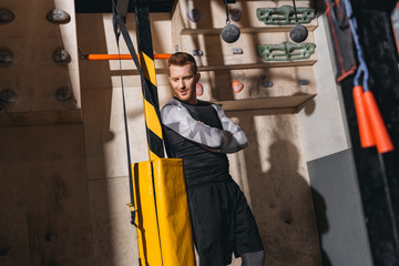 young man in sportive attire at gym