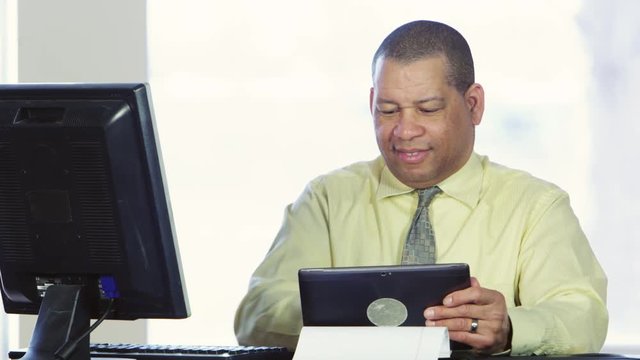 Business man using tablet