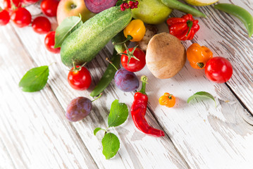 Bio vegetables on old wooden table.