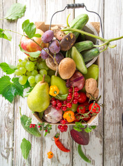 Bio vegetables on old wooden table. © Lukas Gojda
