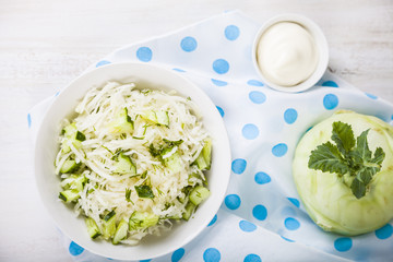 Salad with kohlrabi, cucumber and dill.