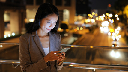 Business woman working on smart phone