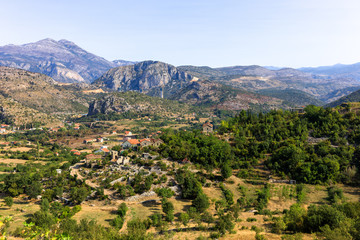 Fototapeta na wymiar Mountain village in the valley - Montenegro